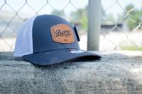 Leather Applique 115 Trucker Hat: CHARCOAL/WHITE